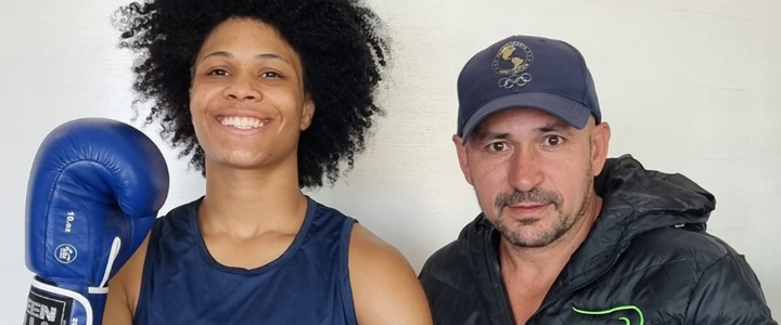 Nicoli de Oliveira com seu treinador